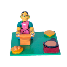 LADY MAKING VADA