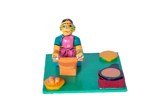 LADY MAKING VADA