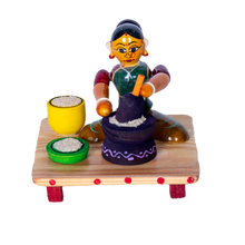 LADY WITH GRINDER