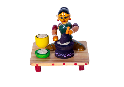 LADY WITH GRINDER