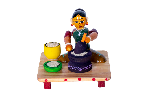 LADY WITH GRINDER