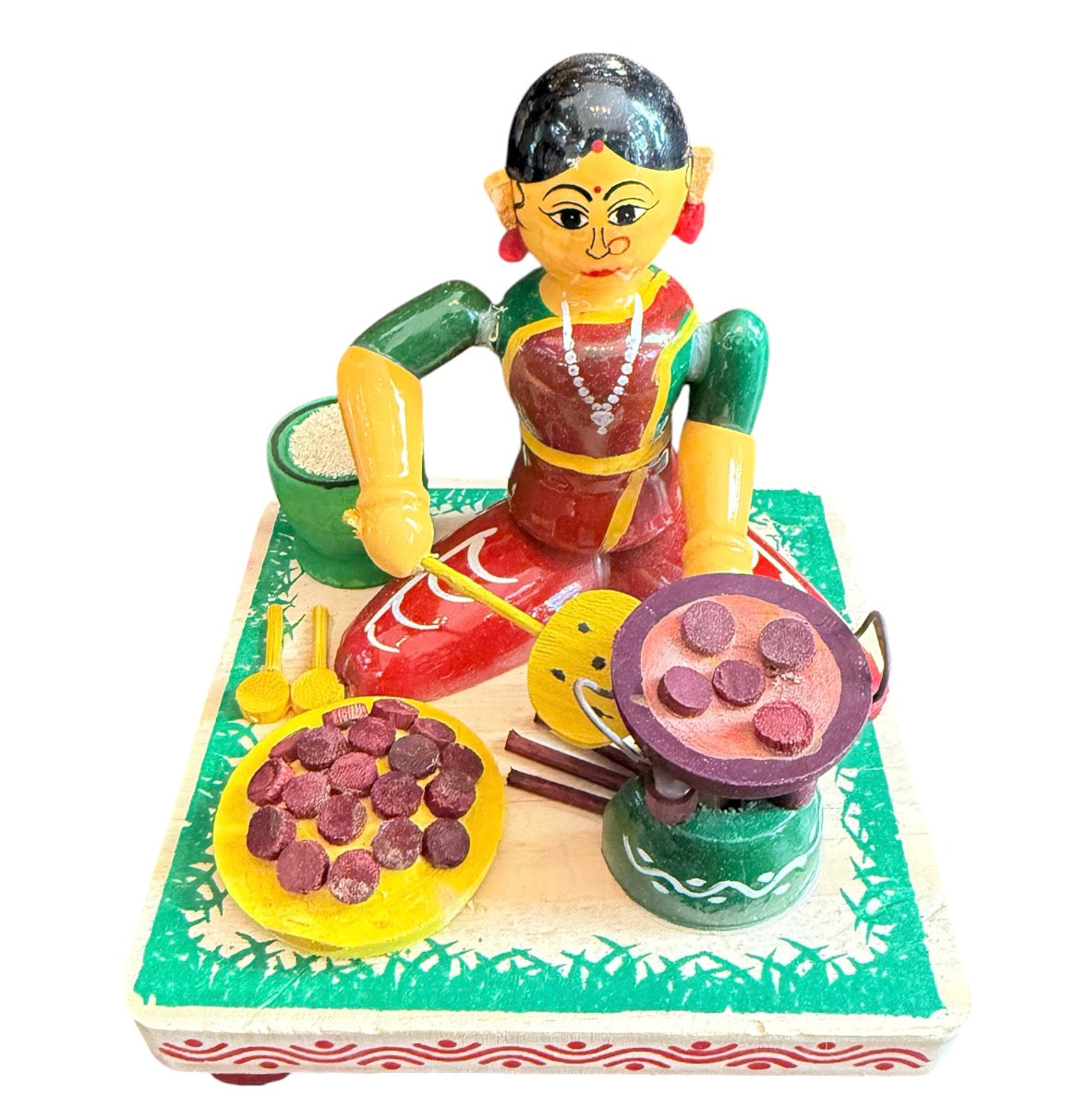 LADY MAKING APPAM
